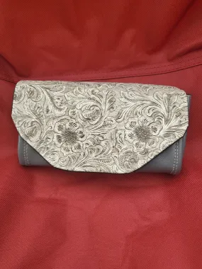 Handmade clutch wallets made with upcycled fabrics - embossed