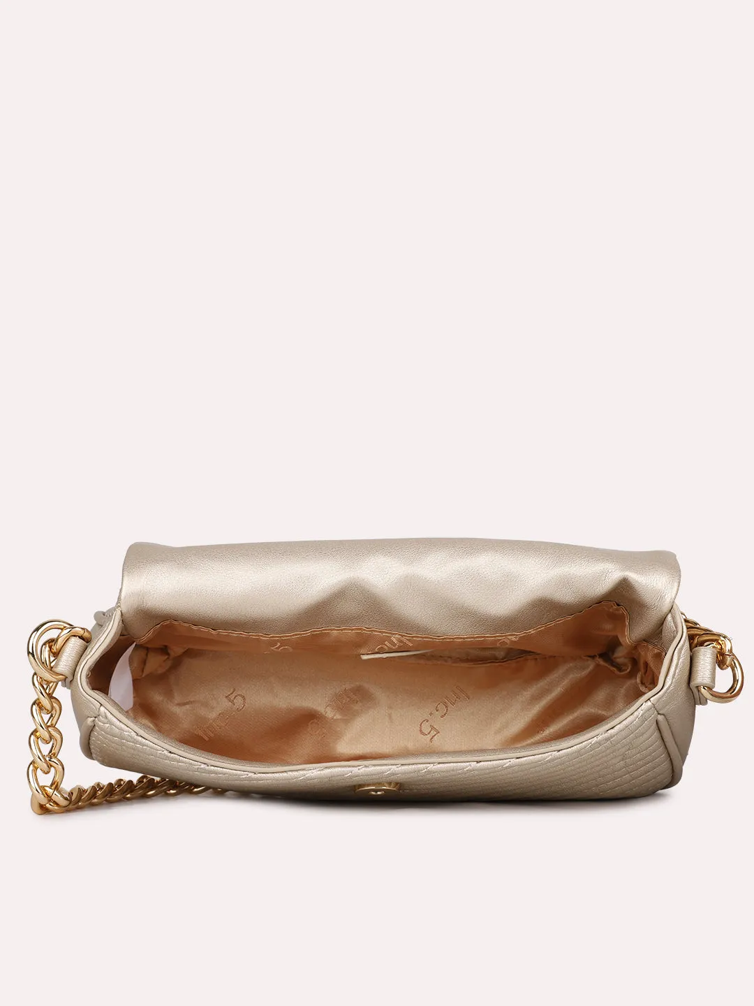 Womens Gold Textured Sling Bag