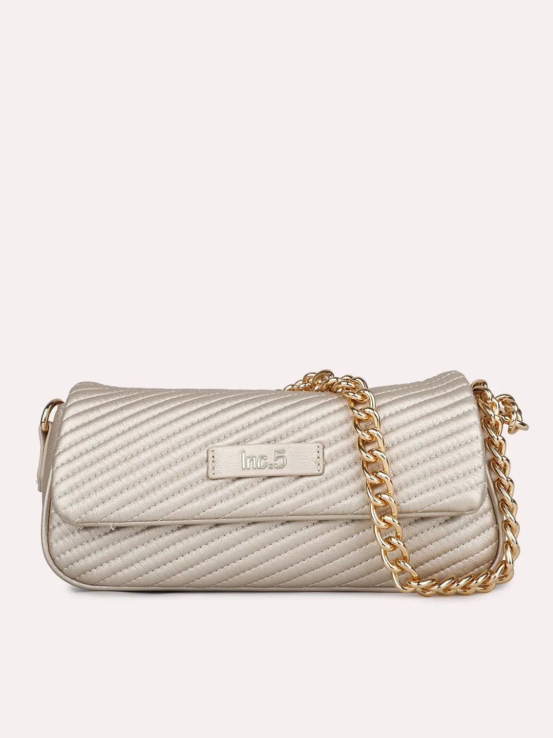 Womens Gold Textured Sling Bag